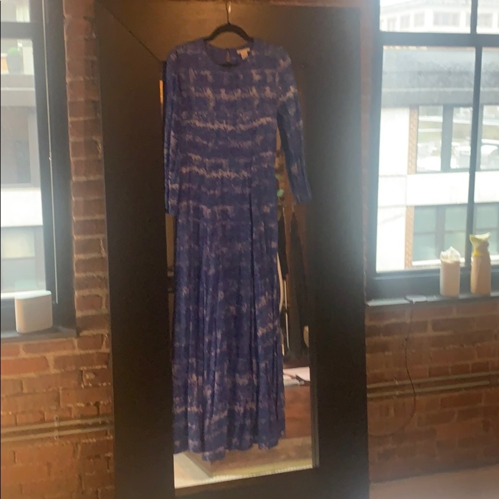 Full length, long sleeve dress.